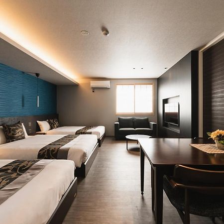 Grand Base Beppu Ekihigashi Aparthotel Bagian luar foto