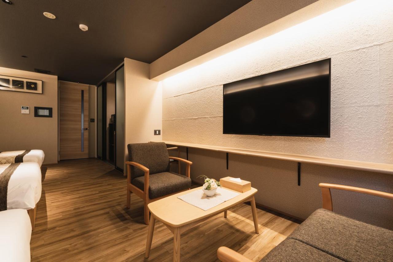 Grand Base Beppu Ekihigashi Aparthotel Bagian luar foto