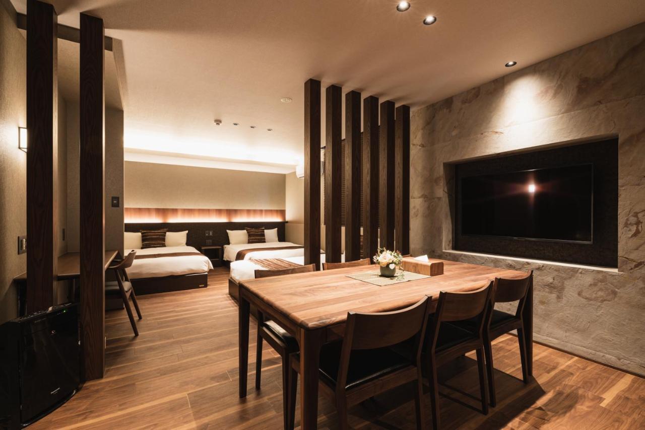 Grand Base Beppu Ekihigashi Aparthotel Bagian luar foto