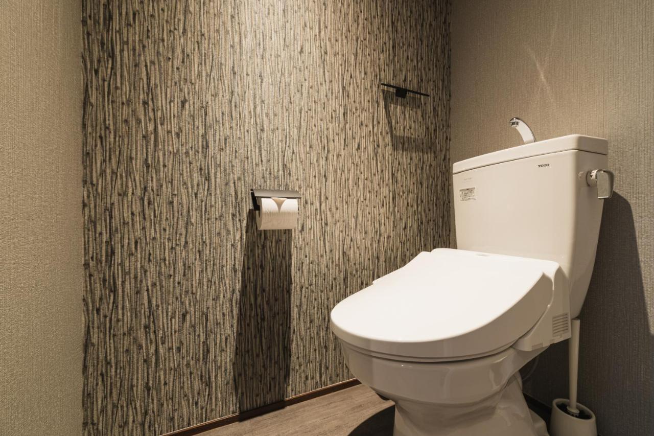 Grand Base Beppu Ekihigashi Aparthotel Bagian luar foto