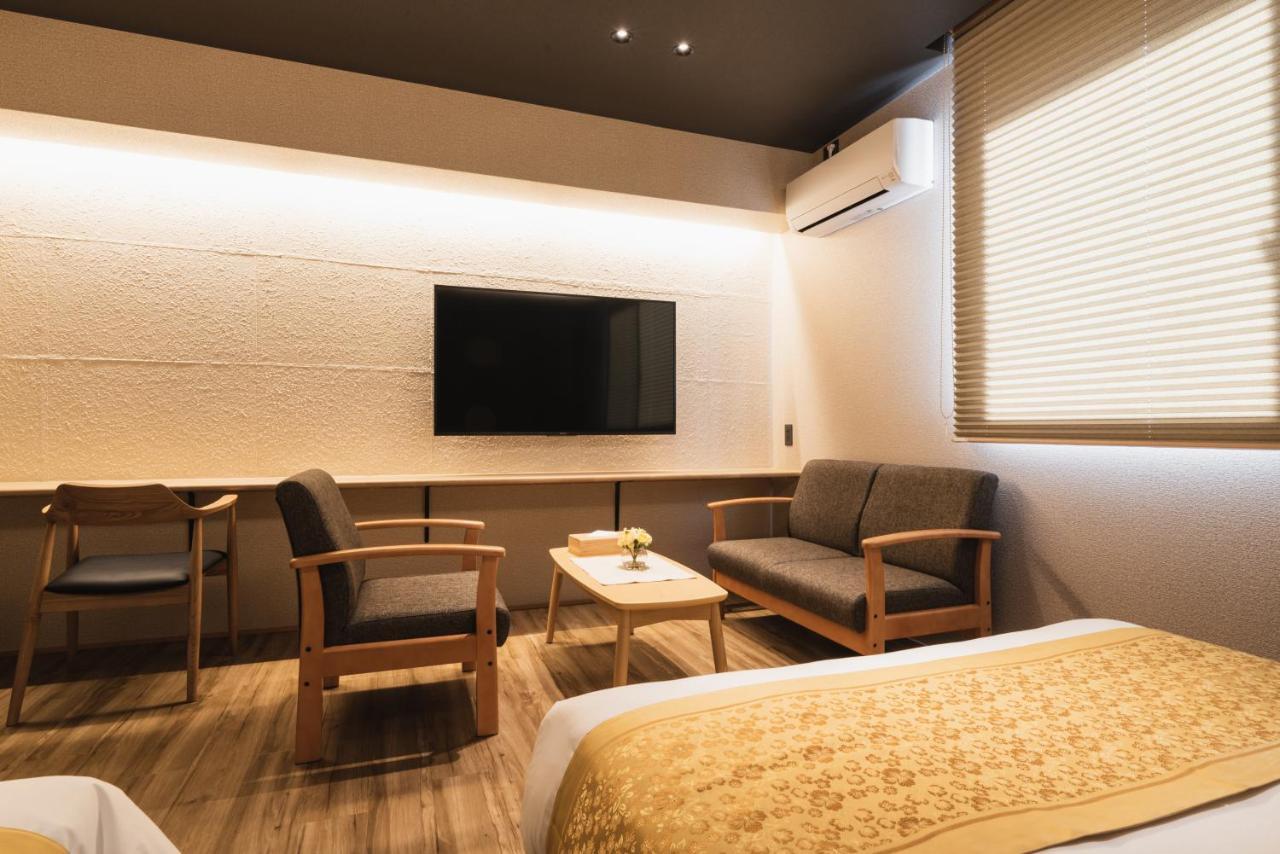 Grand Base Beppu Ekihigashi Aparthotel Bagian luar foto
