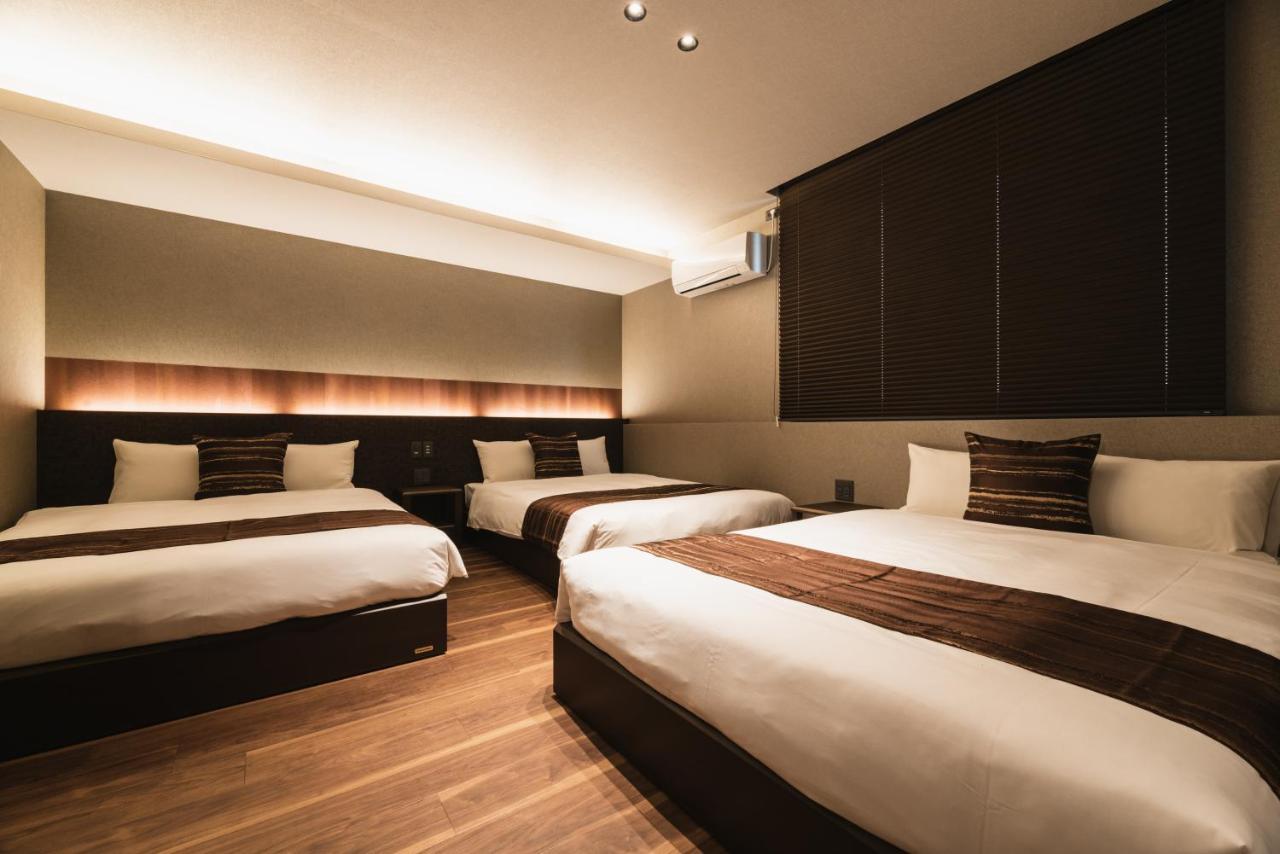 Grand Base Beppu Ekihigashi Aparthotel Bagian luar foto