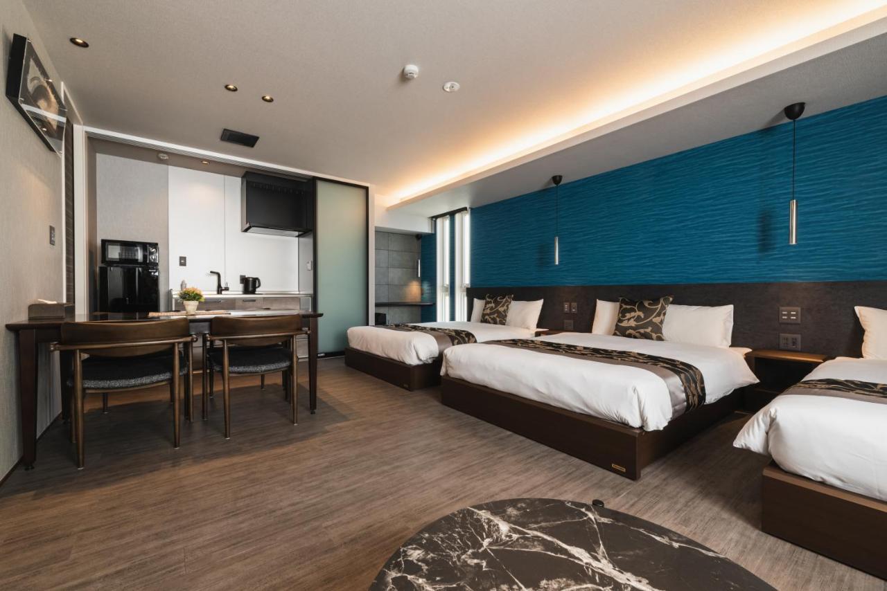 Grand Base Beppu Ekihigashi Aparthotel Bagian luar foto