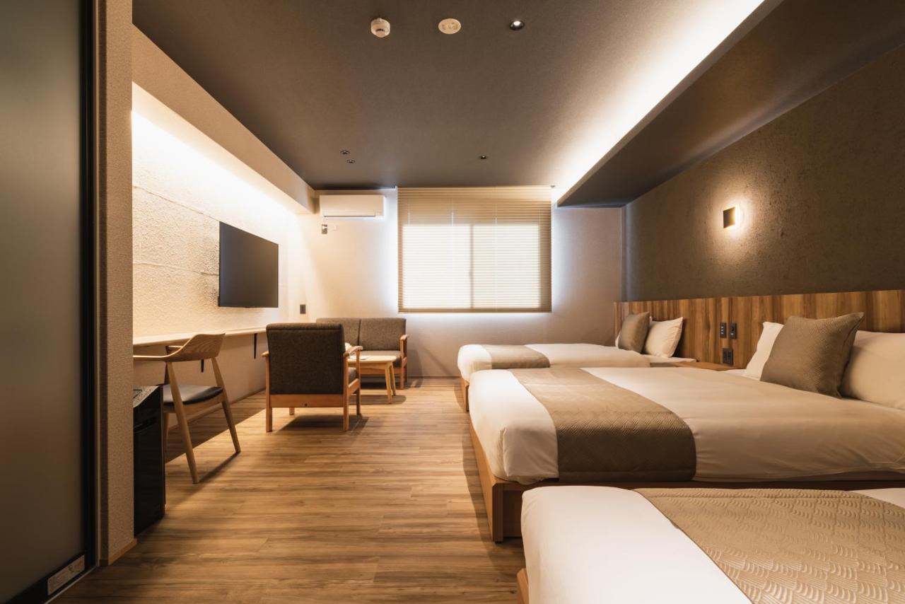 Grand Base Beppu Ekihigashi Aparthotel Bagian luar foto