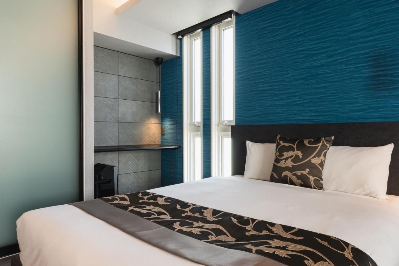 Grand Base Beppu Ekihigashi Aparthotel Bagian luar foto