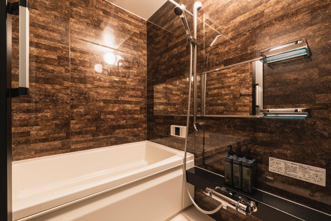 Grand Base Beppu Ekihigashi Aparthotel Bagian luar foto