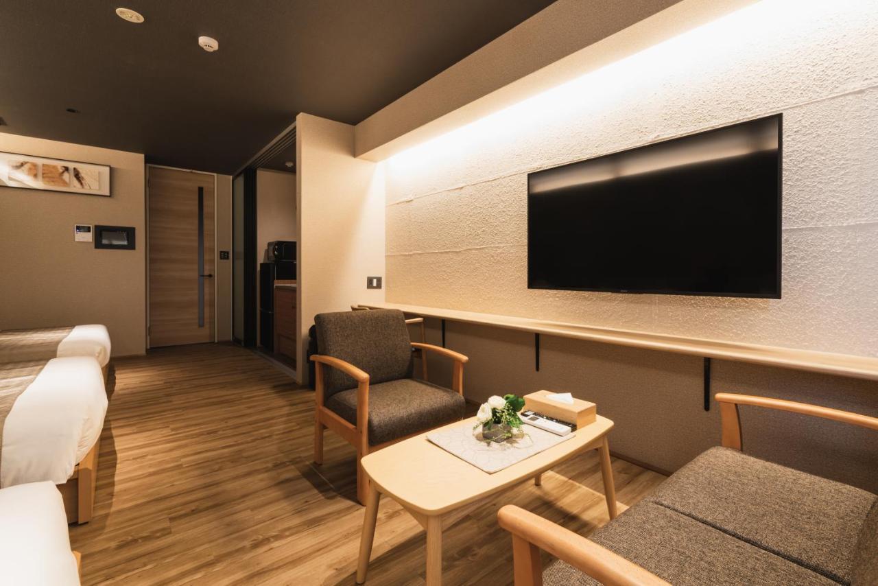 Grand Base Beppu Ekihigashi Aparthotel Bagian luar foto