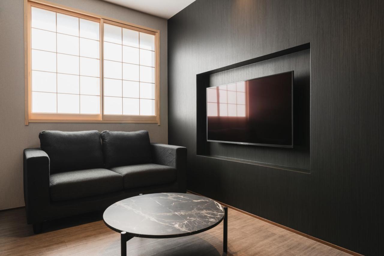 Grand Base Beppu Ekihigashi Aparthotel Bagian luar foto