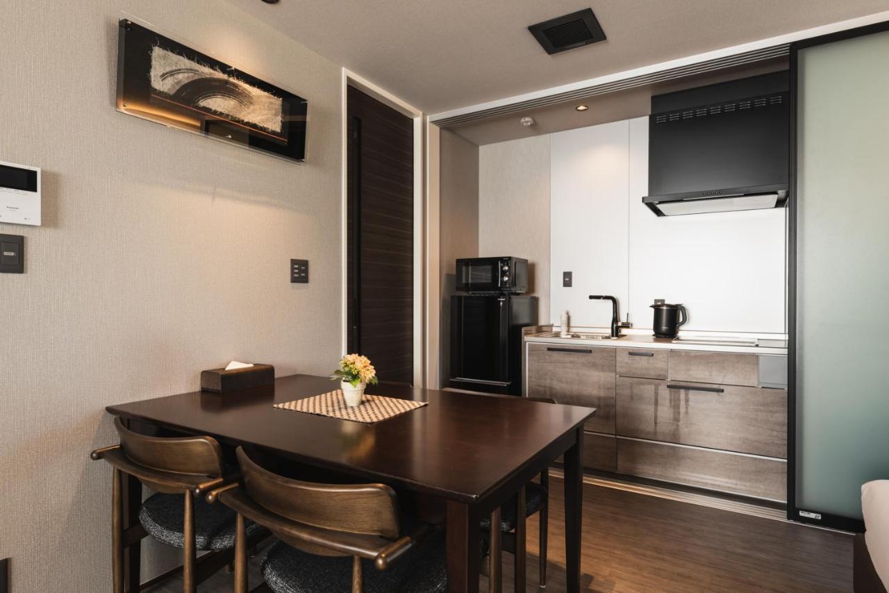 Grand Base Beppu Ekihigashi Aparthotel Bagian luar foto