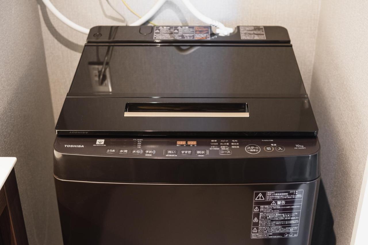 Grand Base Beppu Ekihigashi Aparthotel Bagian luar foto