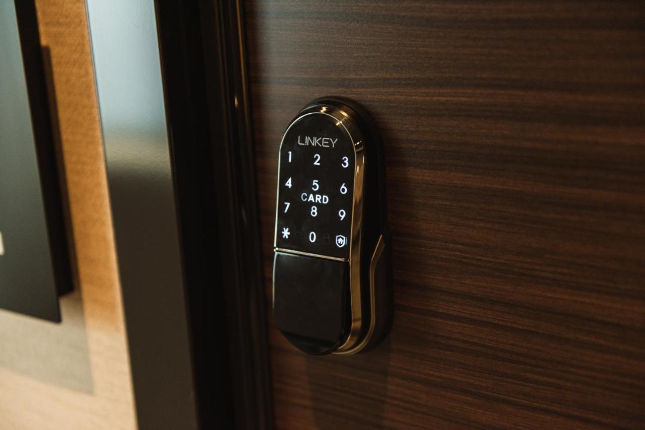 Grand Base Beppu Ekihigashi Aparthotel Bagian luar foto